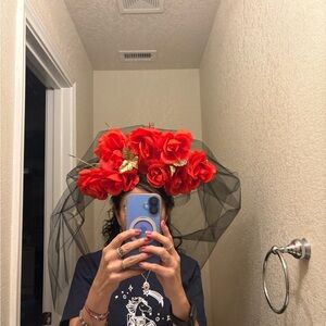 Elegant Red Floral Hair Accessory with Black Veil